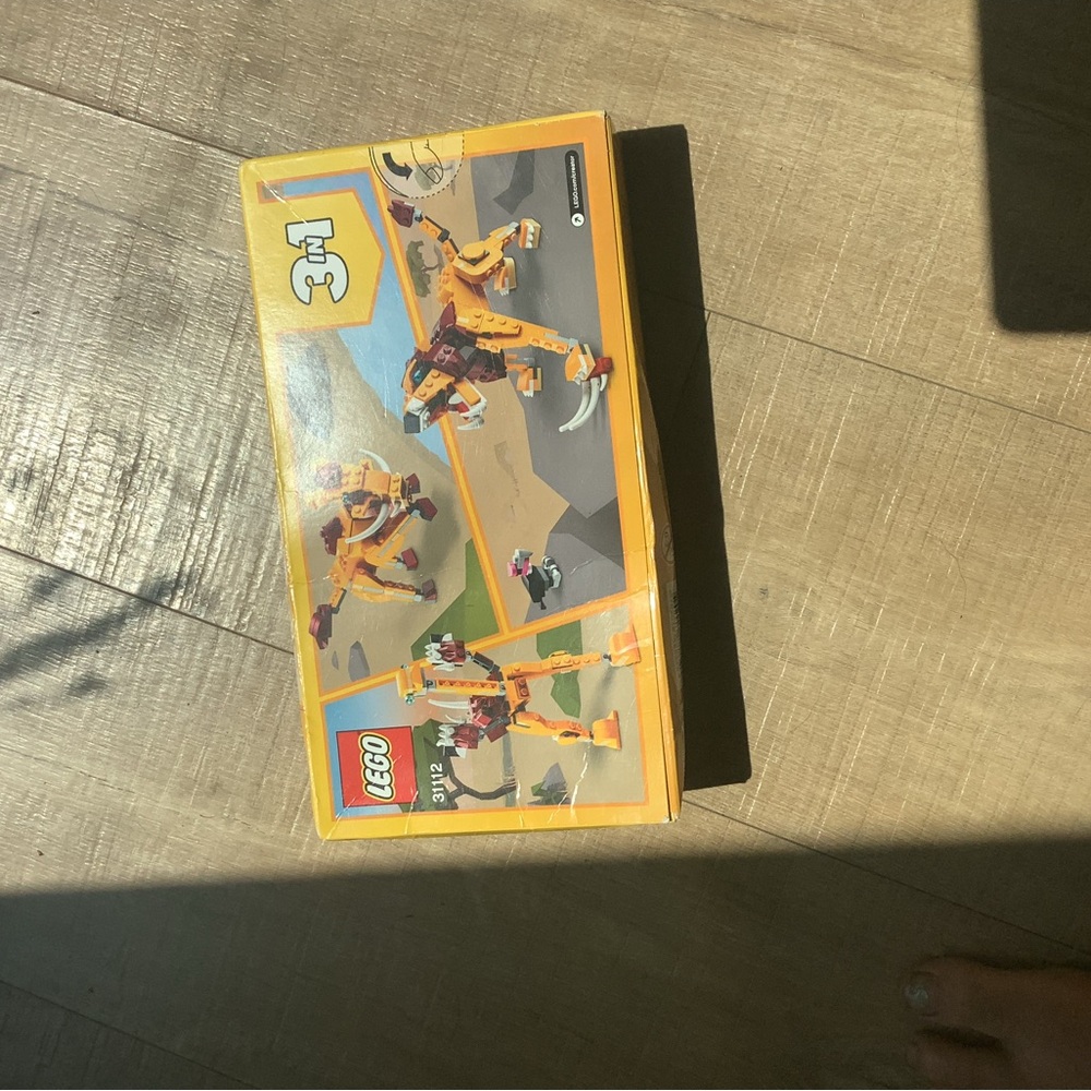 LEGO 3-in-1 Dinosaur Set in Yellow and Orange with price tag from Denmark 🇩🇰